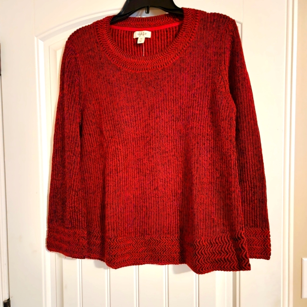 New with tags womens comfy red and black sweater.